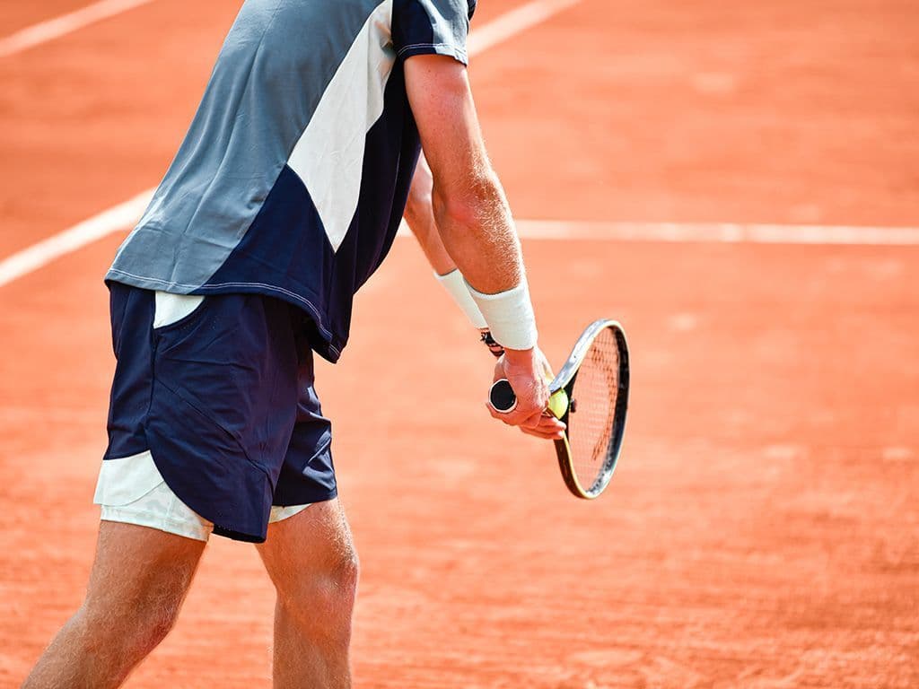 Welk Grand Slam-tornooi is het enige dat op brique pilée wordt beslecht?