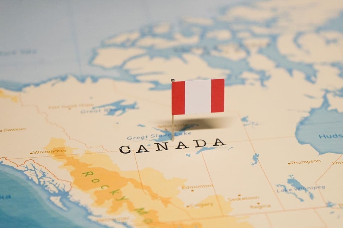 Welke afbeelding staat er op de vlag van Canada?
